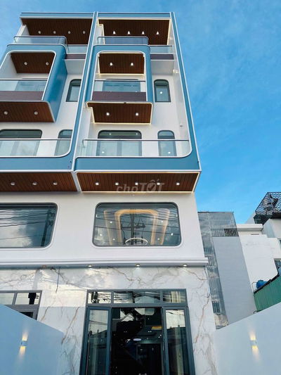 Nhà Mặt Tiền Đường Kinh Doanh ( 4M x 25M ) Sân Xe Hơi Dài 8,1M.