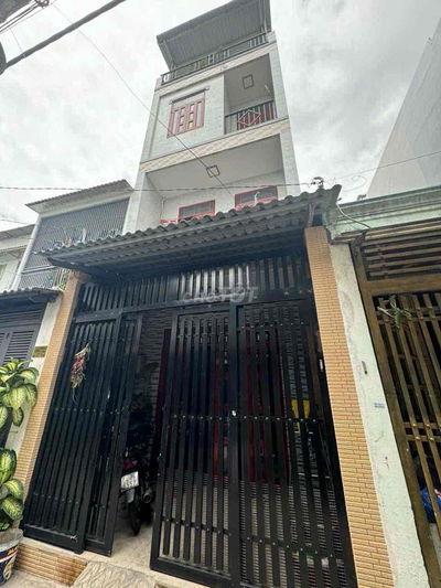 Nhà nguyên căn 1 trệt 2 lầu sân thượng giá 14 triệu