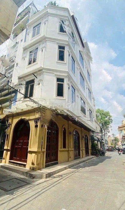 Nhà GÓC 2MT GẦN HAI BÀ TRƯNG Q3. NGANG 14M 1 trệt 4lau.