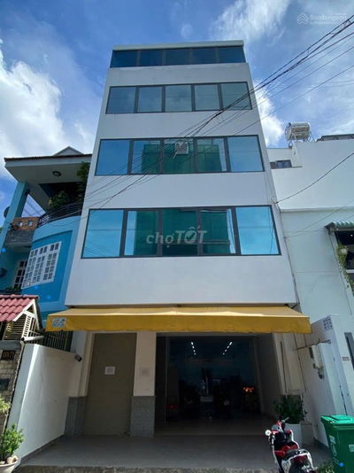 Nhà Mặt Tiền Phổ Quang. P2. 7x23m. 1 Trệt 4 Lầu. Có Thang Máy.