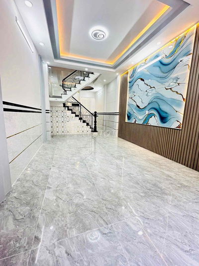 Nhà một trệt hai lầu sân thượng