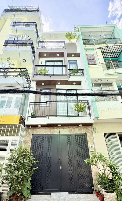 Cho nhà mặt tiền 142B Nguyễn Thị Nhỏ P15 Q11 4,5x22, 4T 18tr