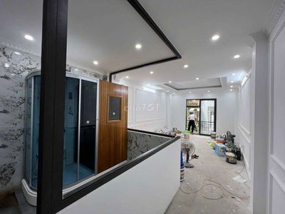Nhà Đống Đa, 70 m2, 7 tầng thang máy, gara ô tô 7 chỗ, chỉ 19.49 tỷ