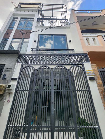 Cần bán 1 căn nhà đẹp mới xây 1 lầu 1 sân thượng mới 100% sổ hồng