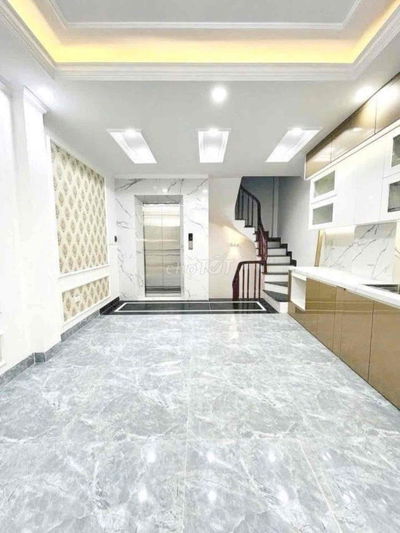 Hàng Xóm Trần Thủ Độ- 6 Tầng Thang máy MT 4m- ô tô qua nhà ngõ thông