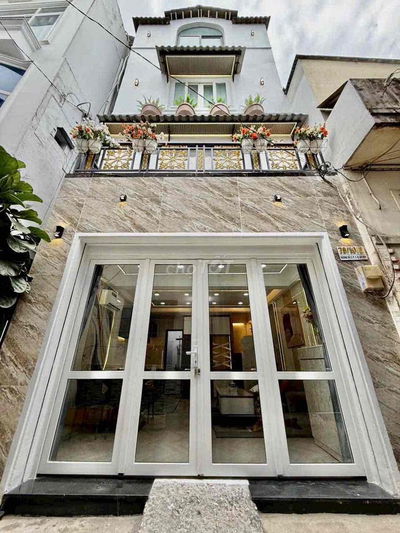 BÁN NHÀ 4TẦNG HXH GẦN SÂN BAY TSN GIÁP PHÚ NHUẬN GIÁ 5Ỷ HƠN