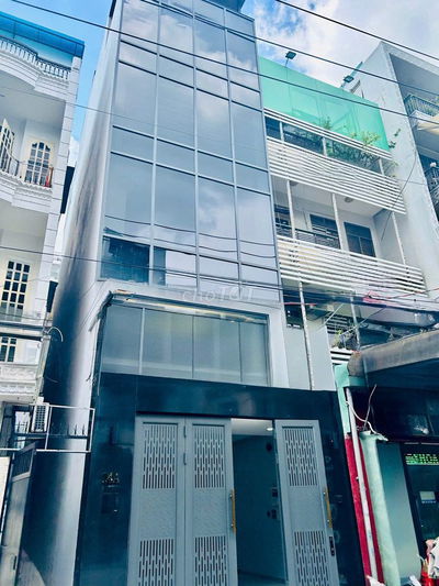 TÒA NHÀ ỐP KÍNH, 5x20m - 24A Hoàng Hoa Thám, P.7, BT - có thang máy
