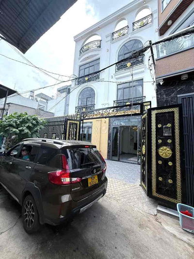 Bán nhà đẹp ngang 9x10m, 4 tầng, sân vườn, hxh 8m Emart Phan Huy Ích