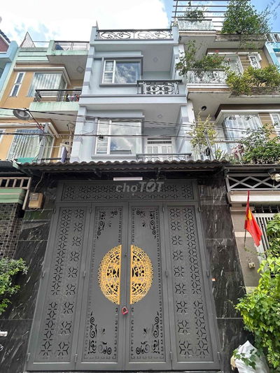 Cần bán nhà một trệt hai lầu sân thượng